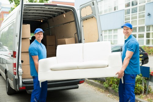 House movers loading furniture for a local home move in Movers