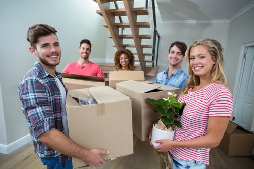 House removalists loading furniture for a local home move in Movers