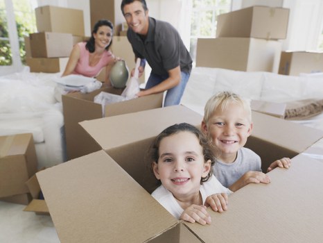 Local movers collecting furniture from a home with careful handling
