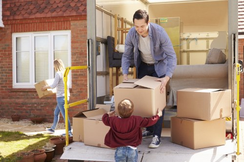 Local moving team preparing items for a home removal