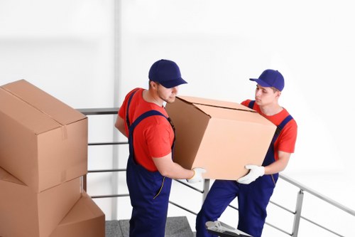 Moving van loading household items for a UK man with van service