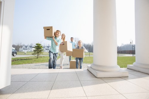 Professional movers handling bulky items during a local move