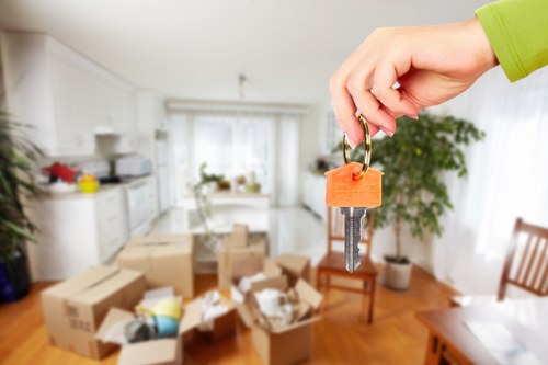 Packed moving boxes and furniture for a home relocation