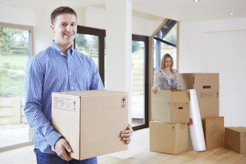 Business staff preparing desks and equipment for an office move