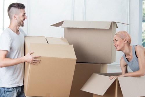 Business relocation team loading office items for transport