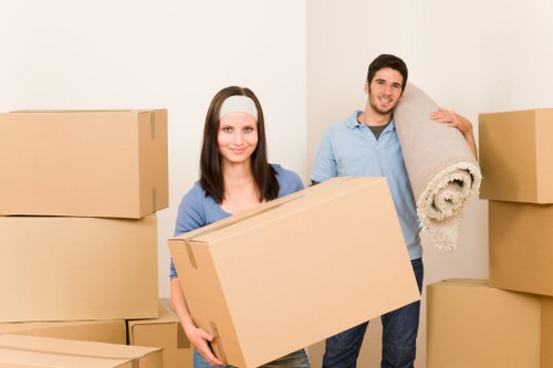 Loading furniture and boxes into a moving van for a local job